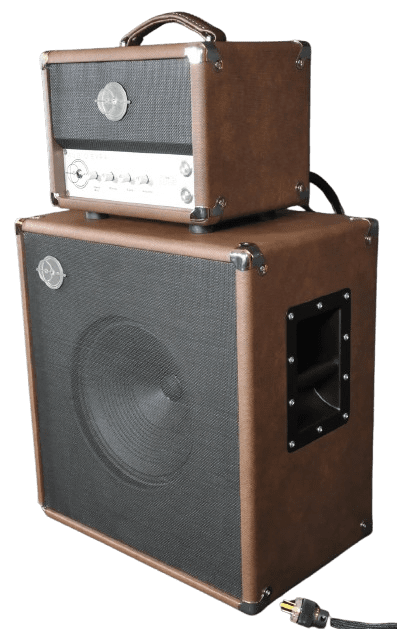 A brown and black speaker sitting on top of a wooden box.